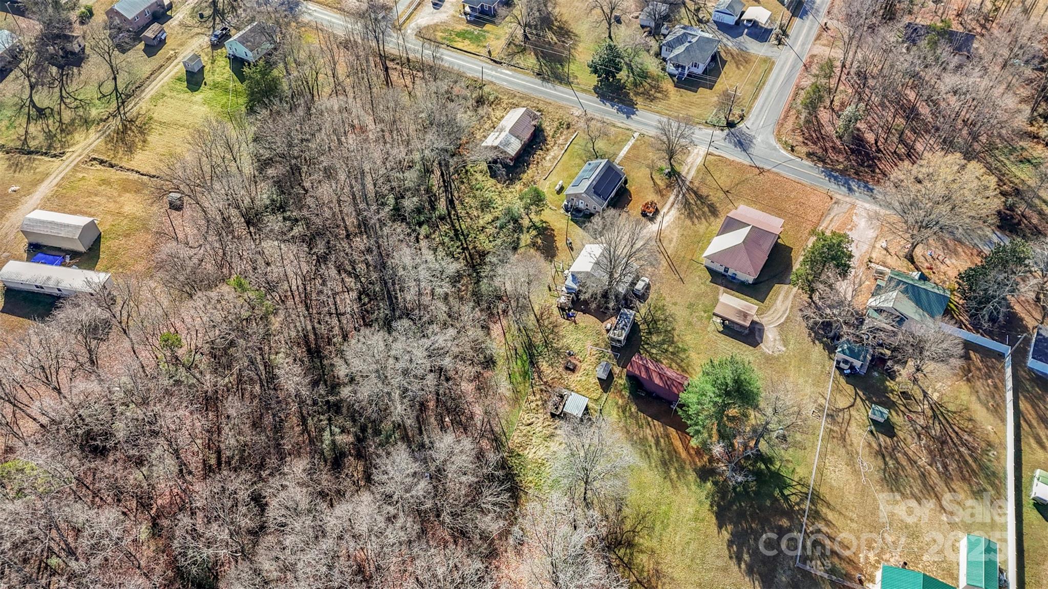 1580 Pine Ridge Road China Grove, NC 28023 - Photo 32 of 35 a backyard of a house with lots of green space