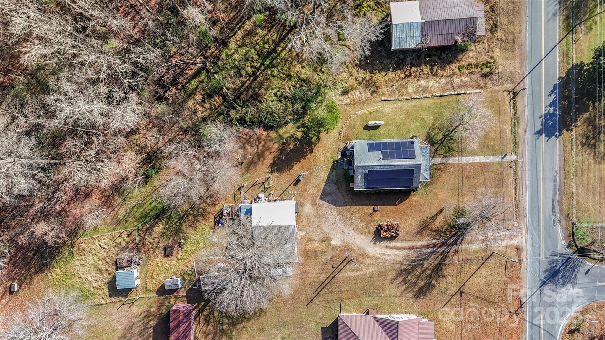 1580 Pine Ridge Road China Grove, NC 28023 - Photo 33 of 35 an aerial view of a house with a yard