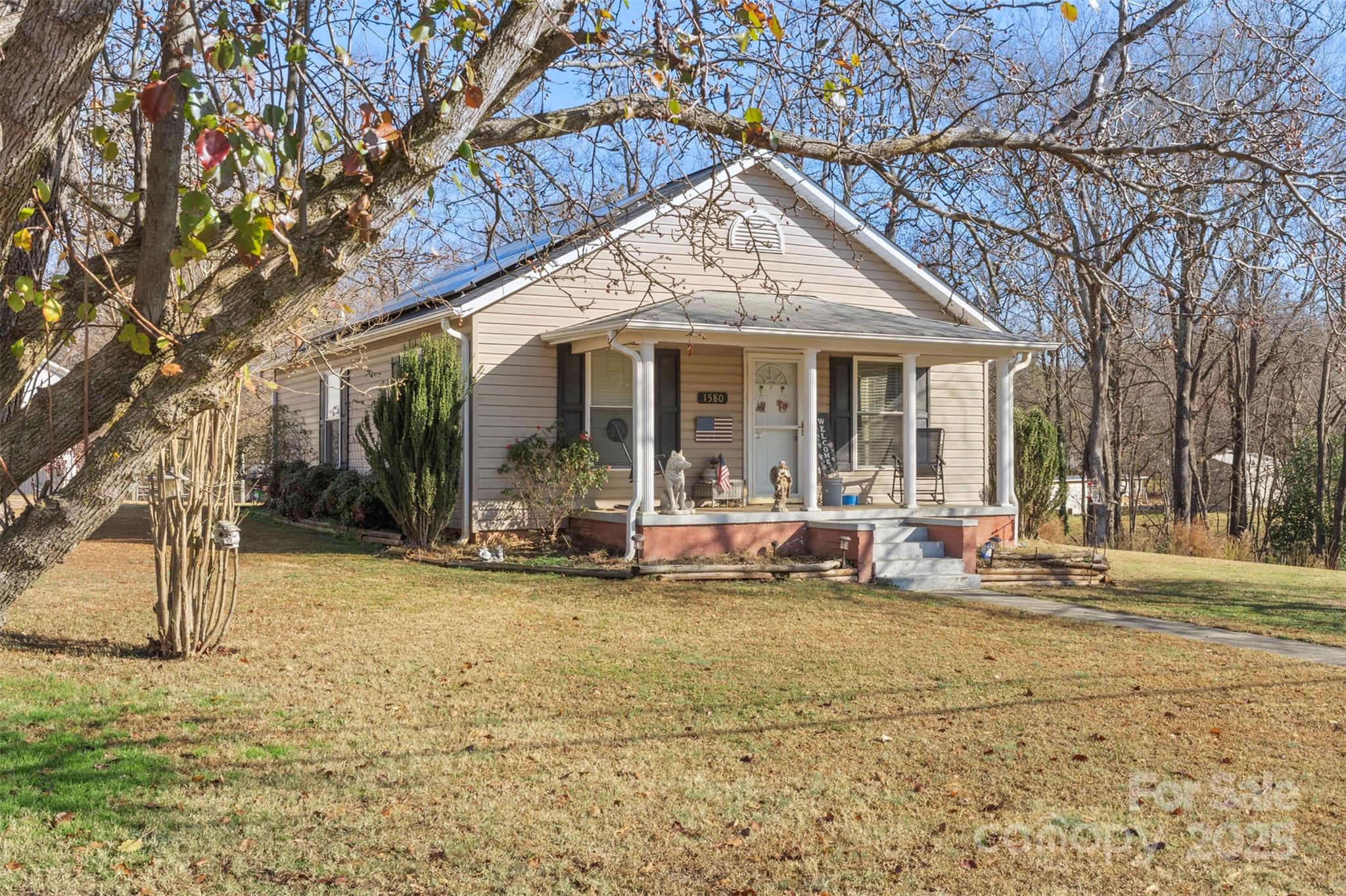 1580 Pine Ridge Road China Grove, NC 28023 - Photo 4 of 35 a view of a house with backyard porch and sitting area