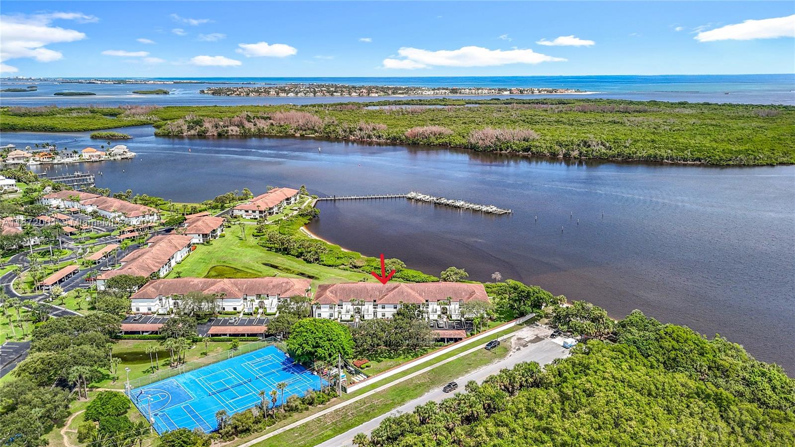 6082 Southeast Landing Way, Unit 11 Stuart, FL 34997 - Photo 14 of 57 a view of a city with an ocean