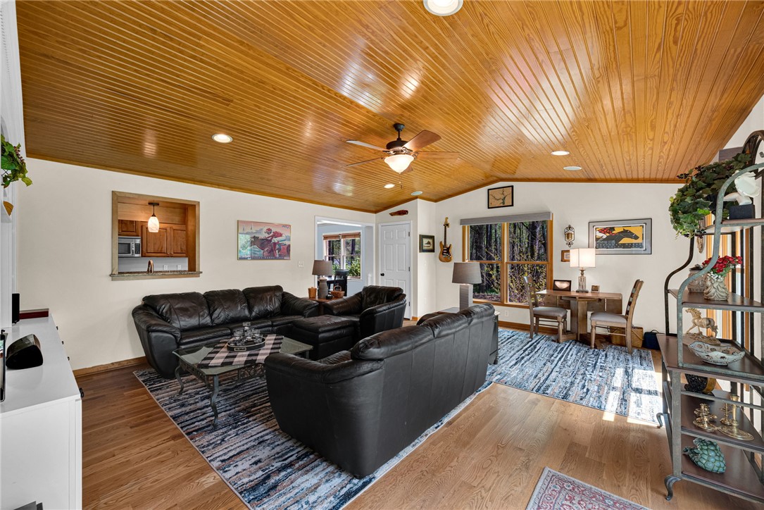 1010 Ridgeview Drive Pendleton, SC 29670 - Photo 20 of 47 This inviting living space features warm wood ceilings and ample natural light, perfect for relaxation.