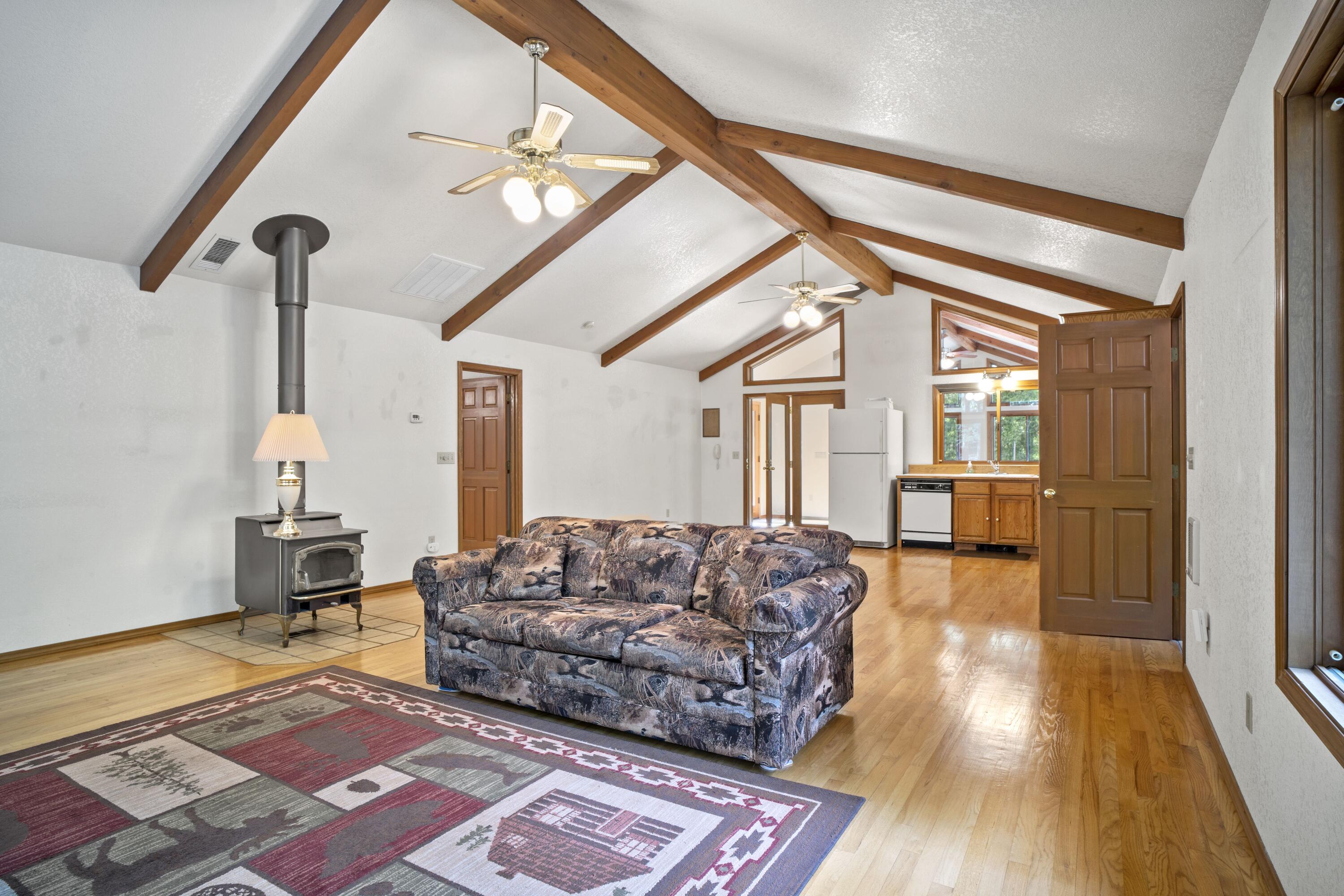 2021 Queens Branch Road Rogue River, OR 97537 - Photo 5 of 37 a living room with furniture and a rug