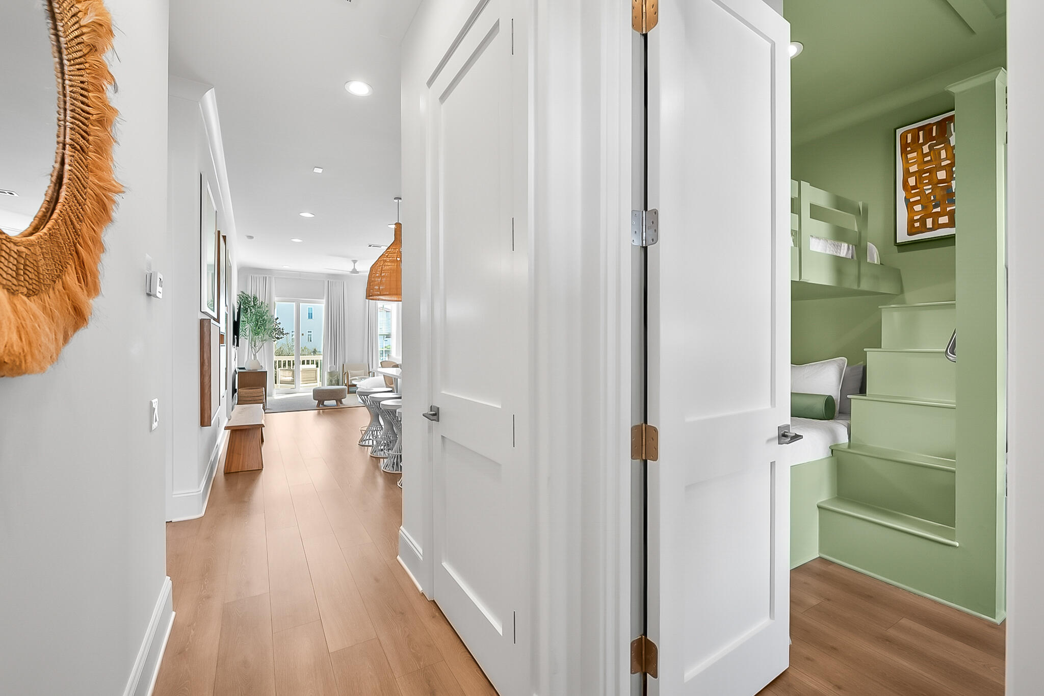 70 Marthas Lane, Unit 2204 Santa Rosa Beach, FL 32459 - Photo 4 of 29 a view of a hallway with wooden floor windows and livingroom