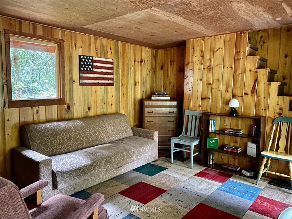 8711 Kachess Lake Road Easton, WA 98925 - Photo 7 of 24 a living room with furniture and a window