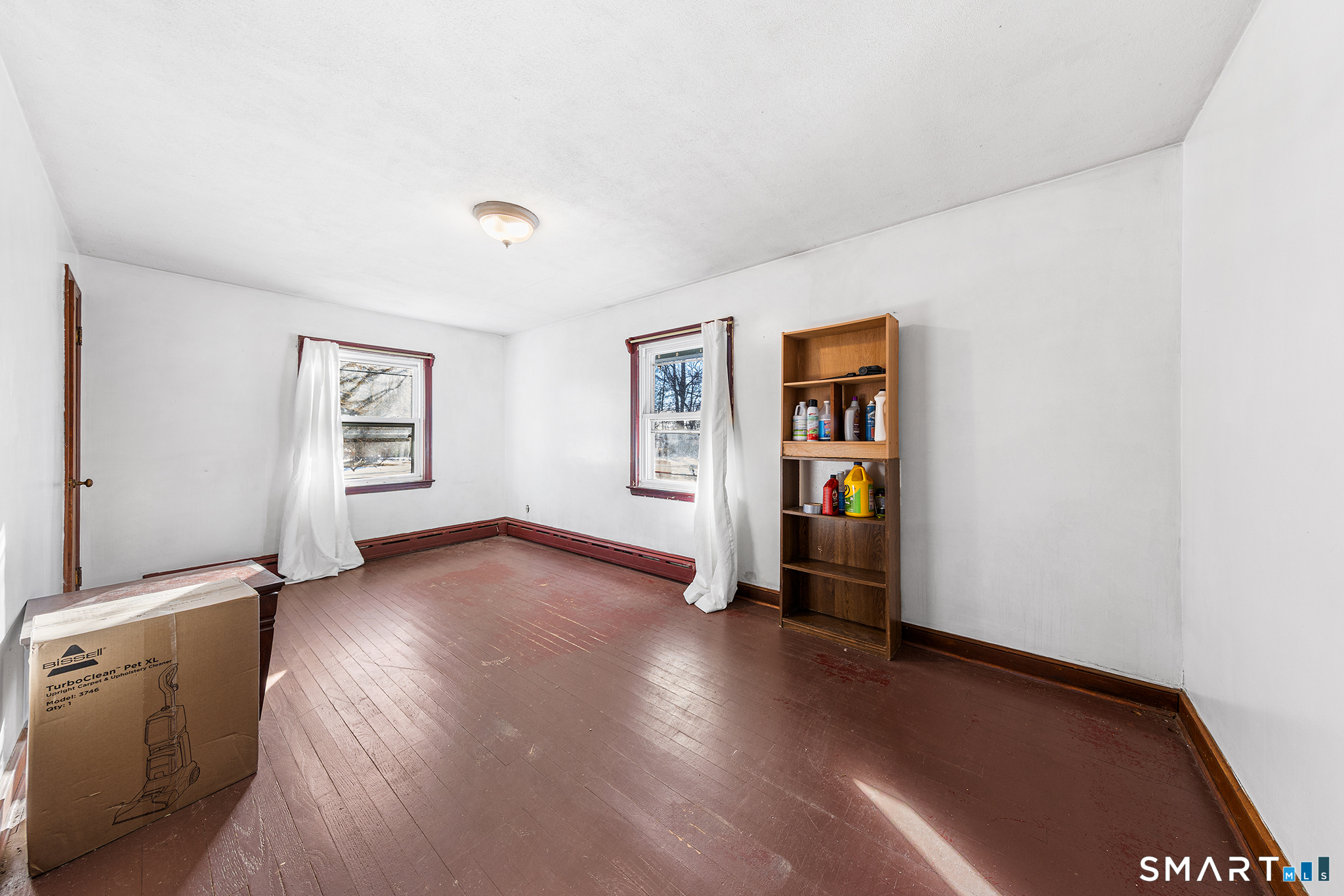 280 Village Hill Road Willington, CT 06279 - Photo 19 of 35 a view of an empty room with window and wooden floor
