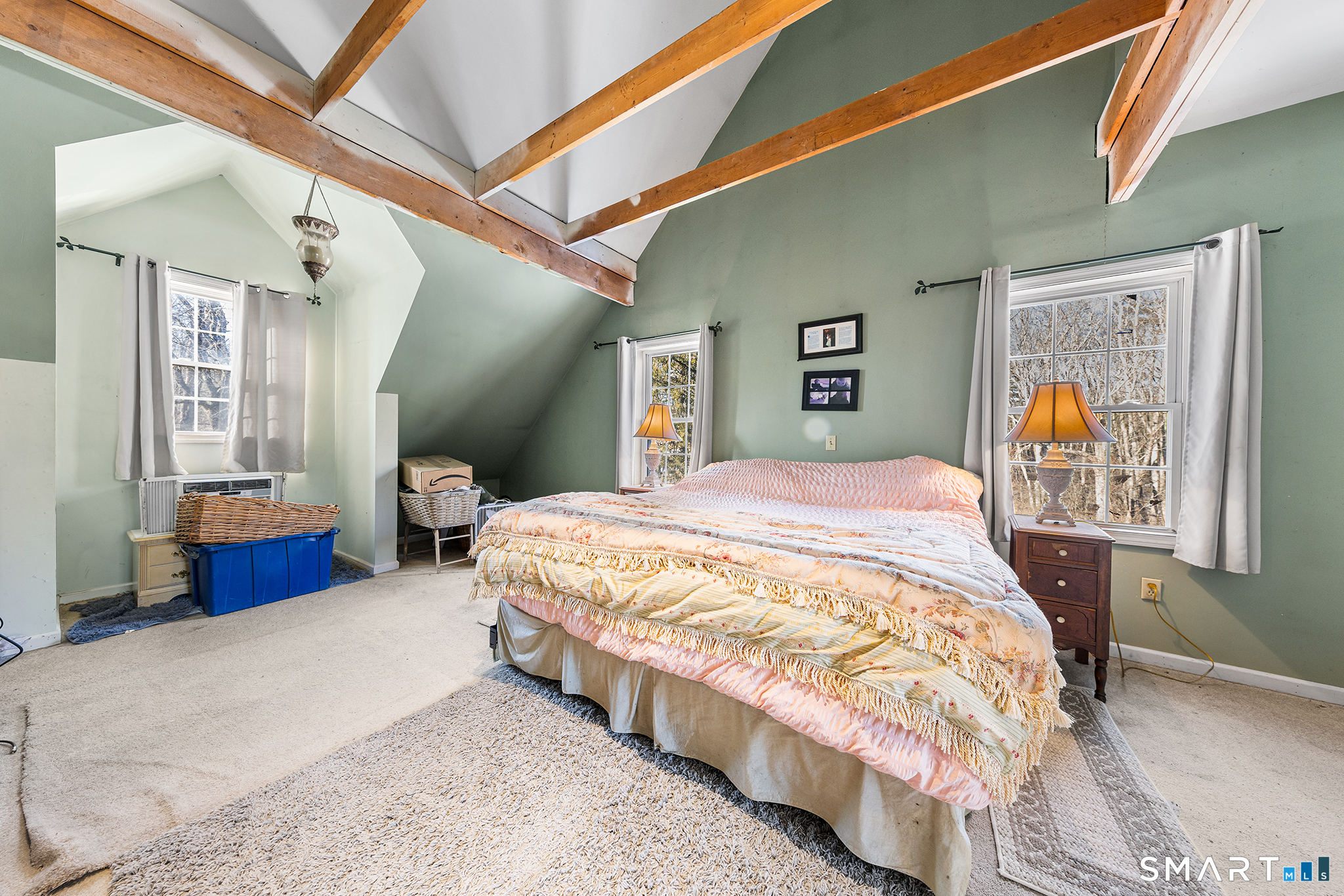 280 Village Hill Road Willington, CT 06279 - Photo 24 of 35 a spacious bedroom with a large bed and a chandelier