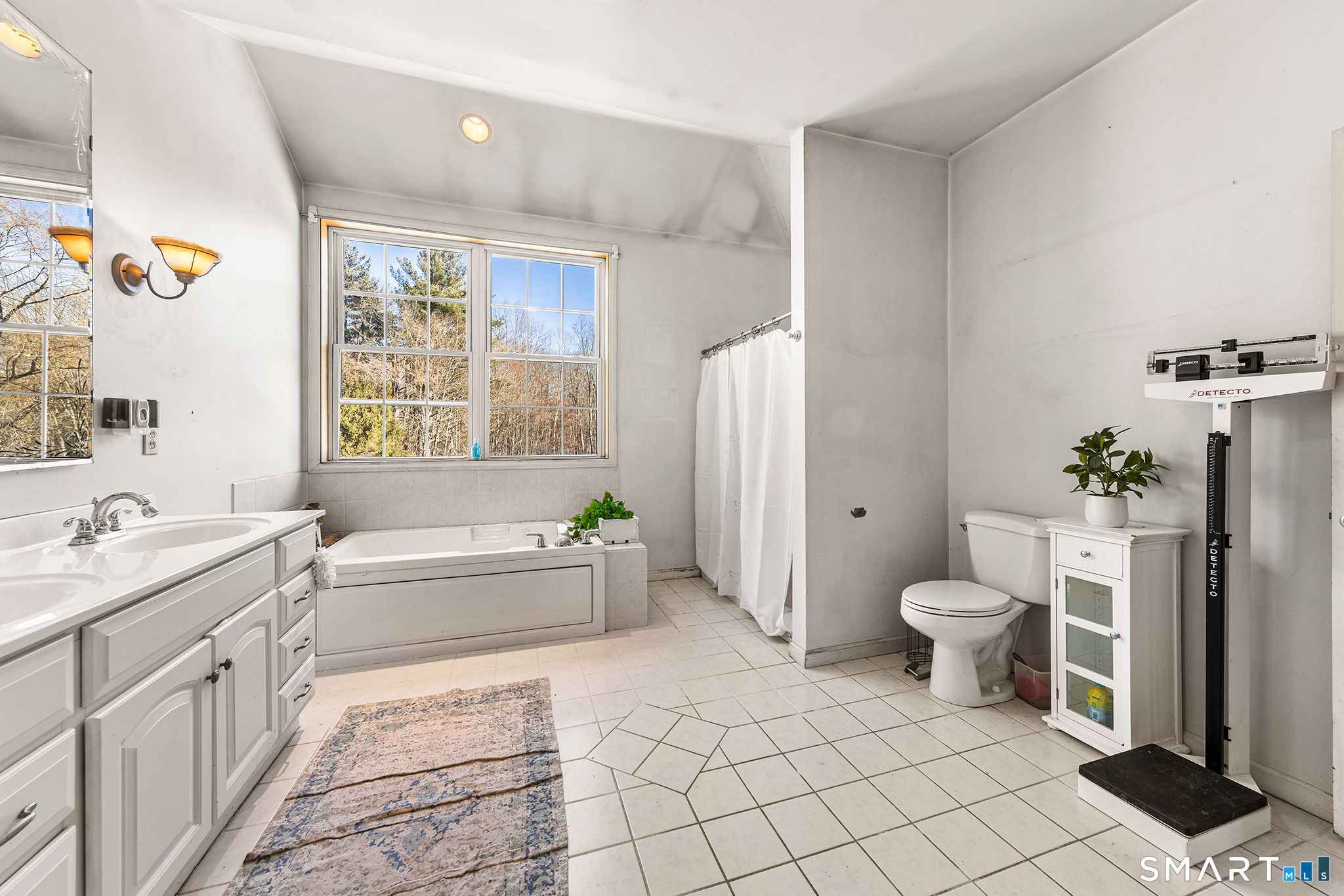 280 Village Hill Road Willington, CT 06279 - Photo 26 of 35 a bathroom with a granite countertop toilet a sink and a bathtub