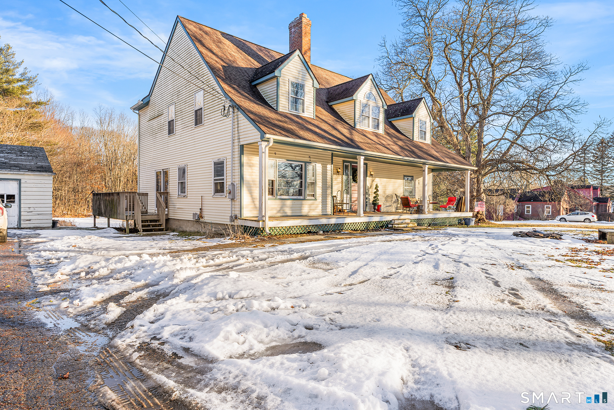 280 Village Hill Road Willington, CT 06279 - Photo 32 of 35 a view of a white house with a snow on the road