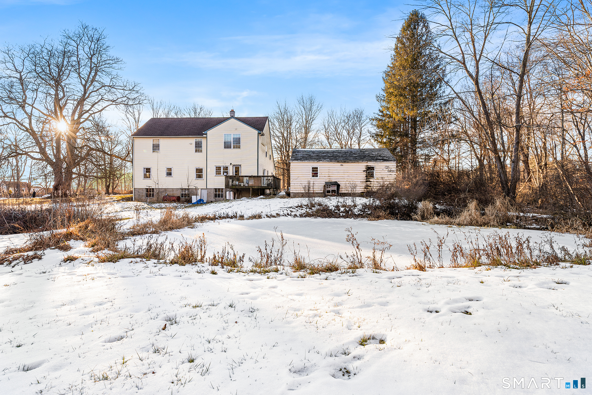 280 Village Hill Road Willington, CT 06279 - Photo 33 of 35 a view of a white house with a yard