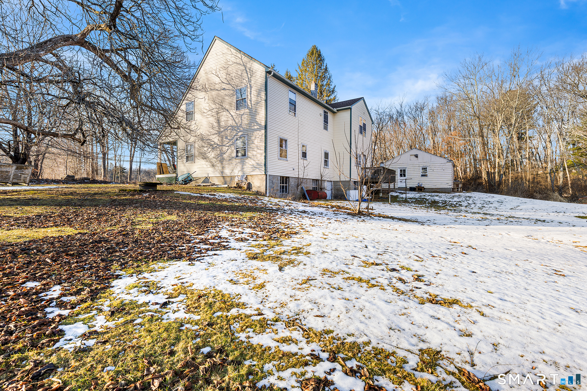 280 Village Hill Road Willington, CT 06279 - Photo 34 of 35 a view of a white house with a snow on the road