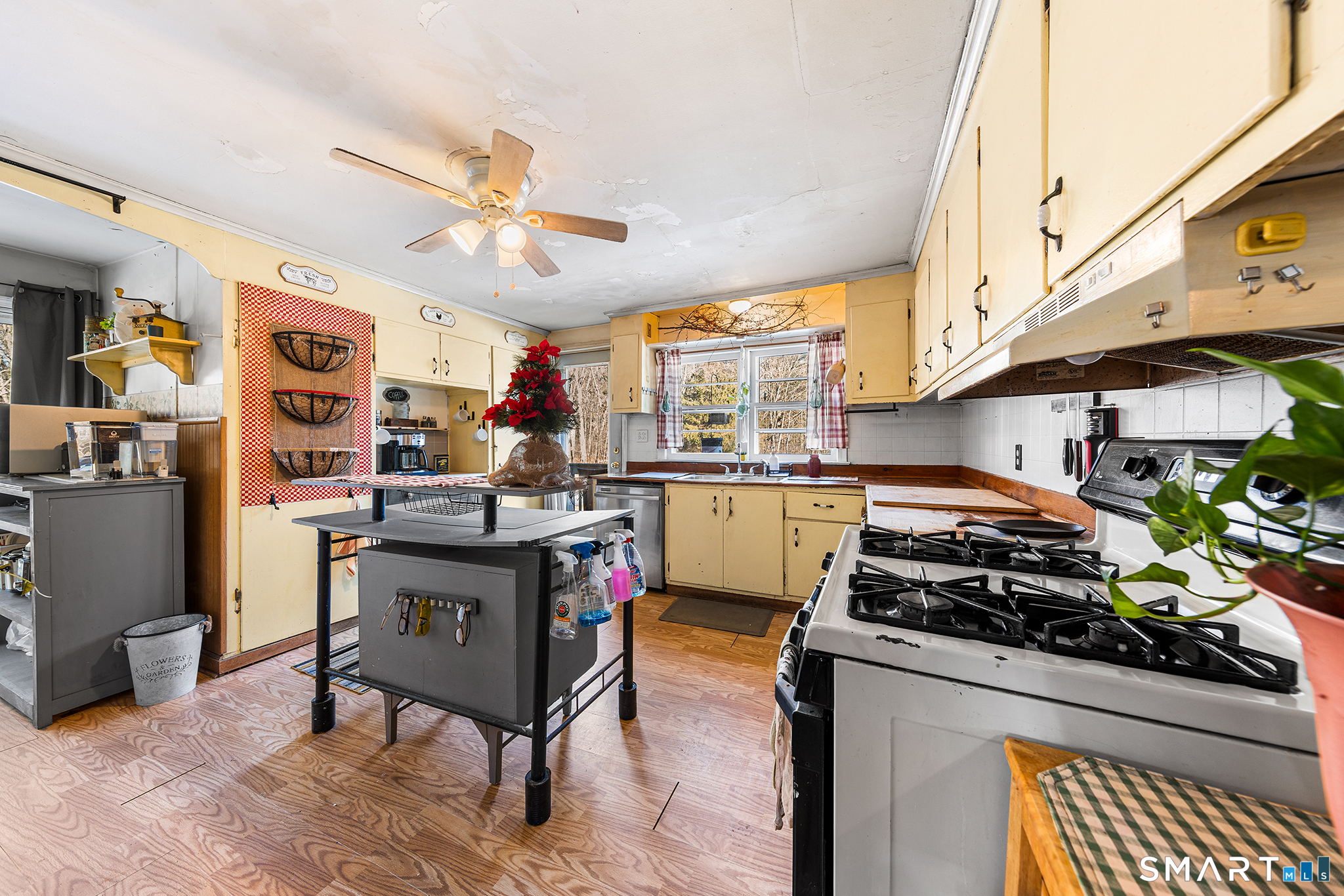 280 Village Hill Road Willington, CT 06279 - Photo 9 of 35 a kitchen with stainless steel appliances granite countertop a stove and a refrigerator