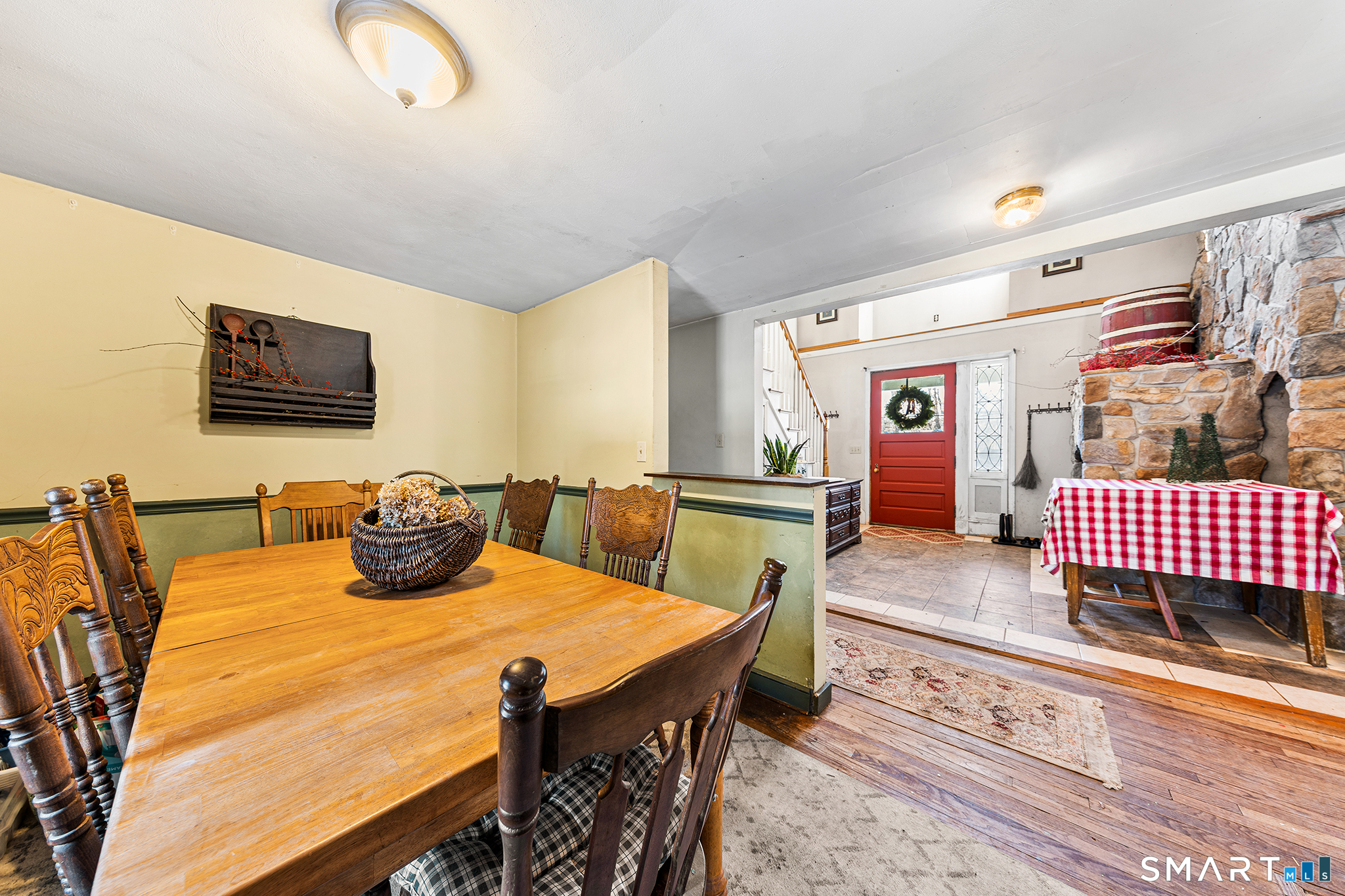 280 Village Hill Road Willington, CT 06279 - Photo 10 of 35 a bedroom with a bed and wooden floor