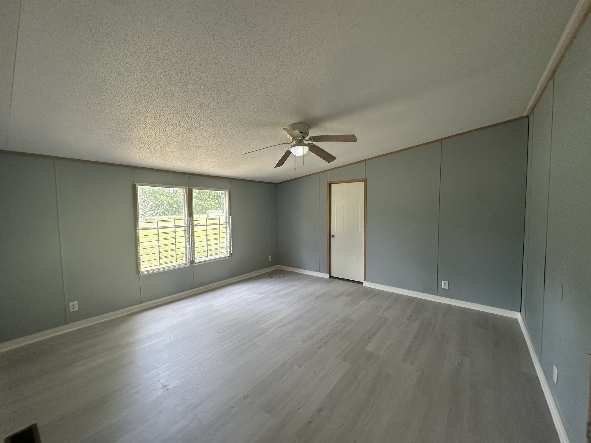 2229 Meekins Road Cleveland, TX 77328 - Photo 14 of 48 a view of an empty room with a window