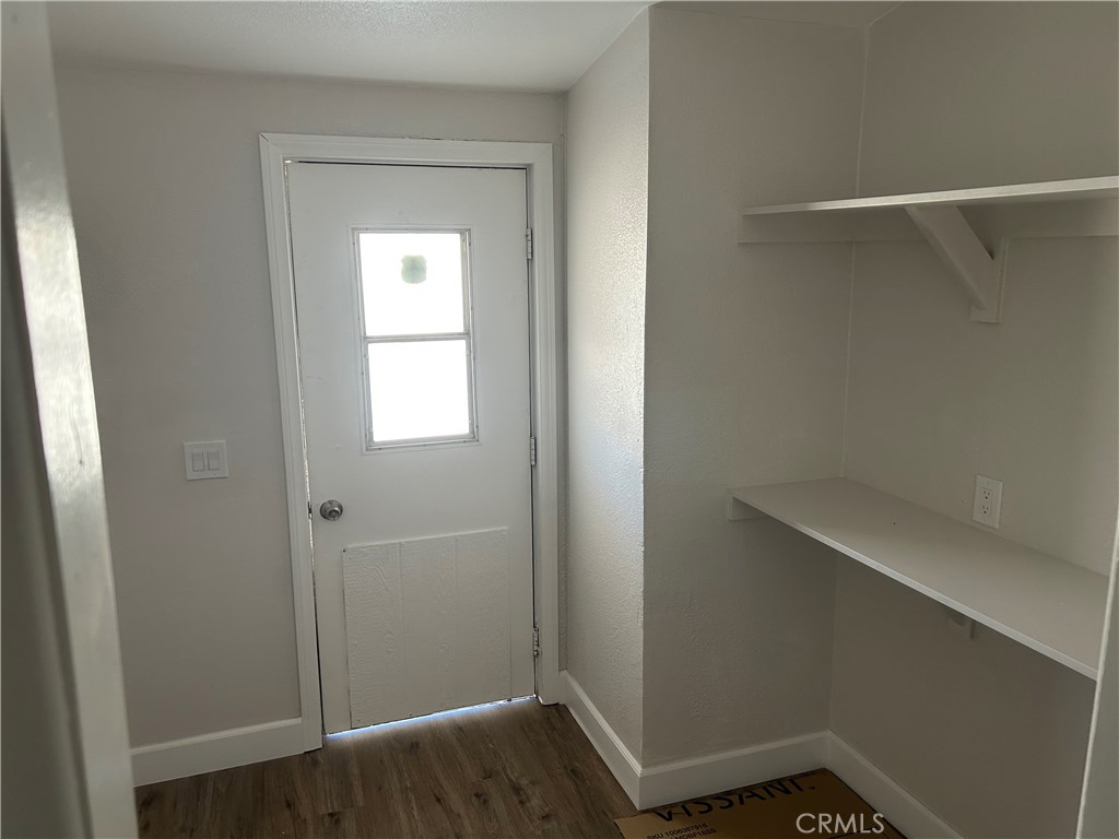 13340 Mesquite Road Whitewater, CA 92282 - Photo 9 of 15 a small space with wooden floor and a window