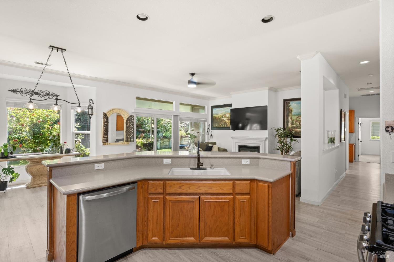 602 Summerset Drive Rio Vista, CA 94571 - Photo 13 of 65 Kitchen island with sink, disposal and dishwasher