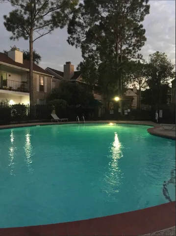 a view of a golf course with a lake