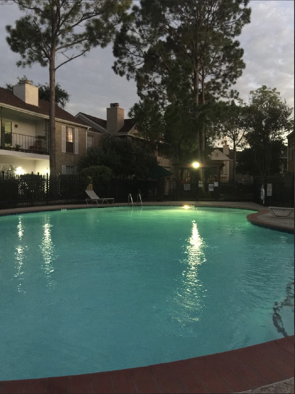 2800 Jeanetta Street, Unit 2706 Houston, TX 77063 - Photo 16 of 19 a view of a golf course with a lake