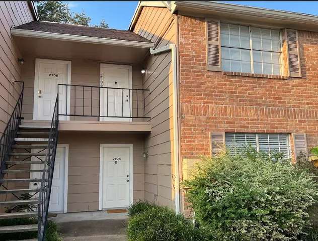 a building with a window and balcony