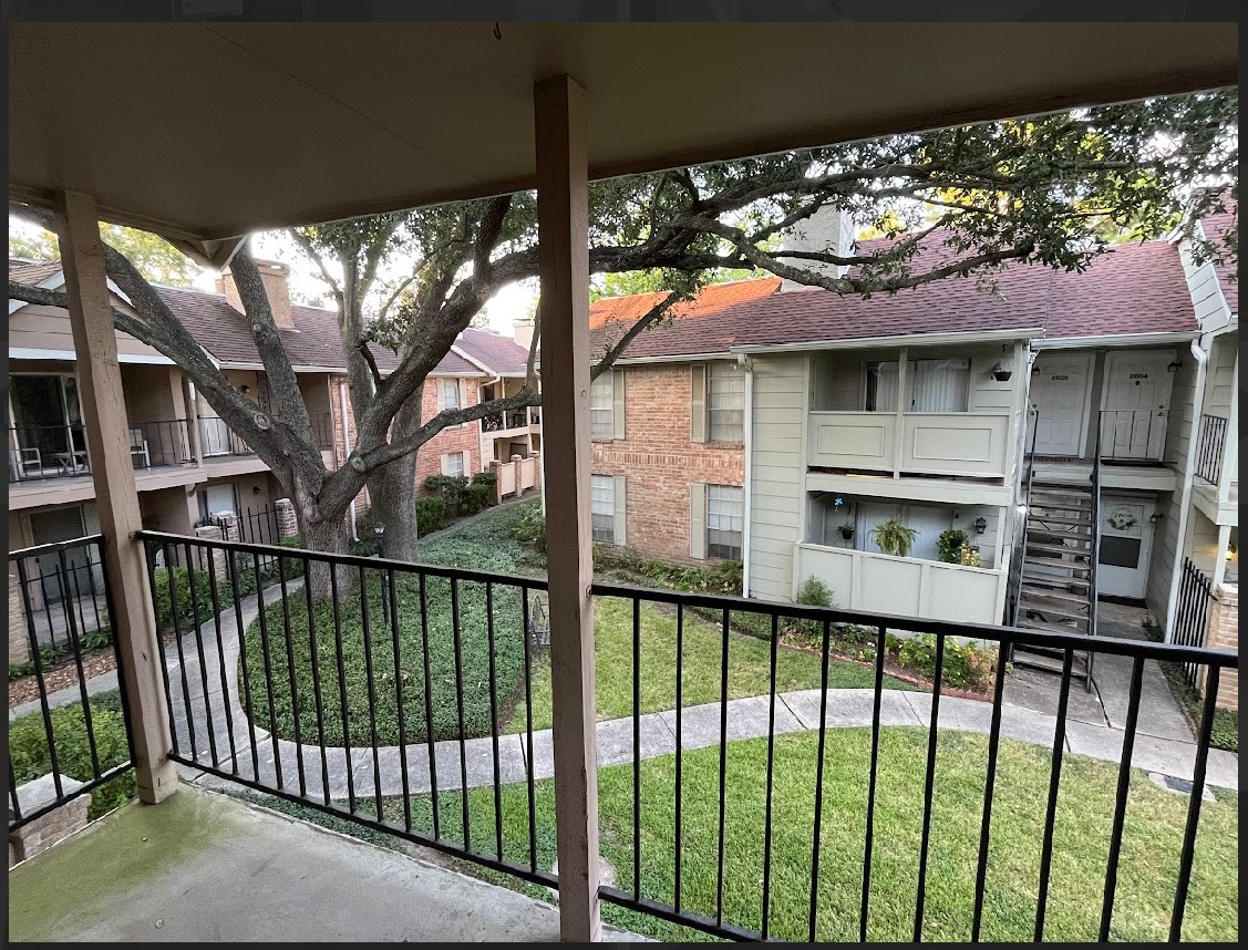 2800 Jeanetta Street, Unit 2706 Houston, TX 77063 - Photo 6 of 19 a view of a house with a iron gate