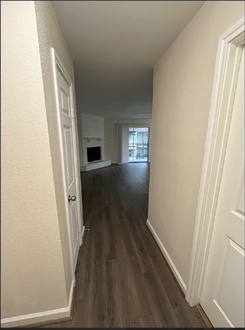 2800 Jeanetta Street, Unit 2706 Houston, TX 77063 - Photo 7 of 19 a view of hallway with wooden floor and stairs