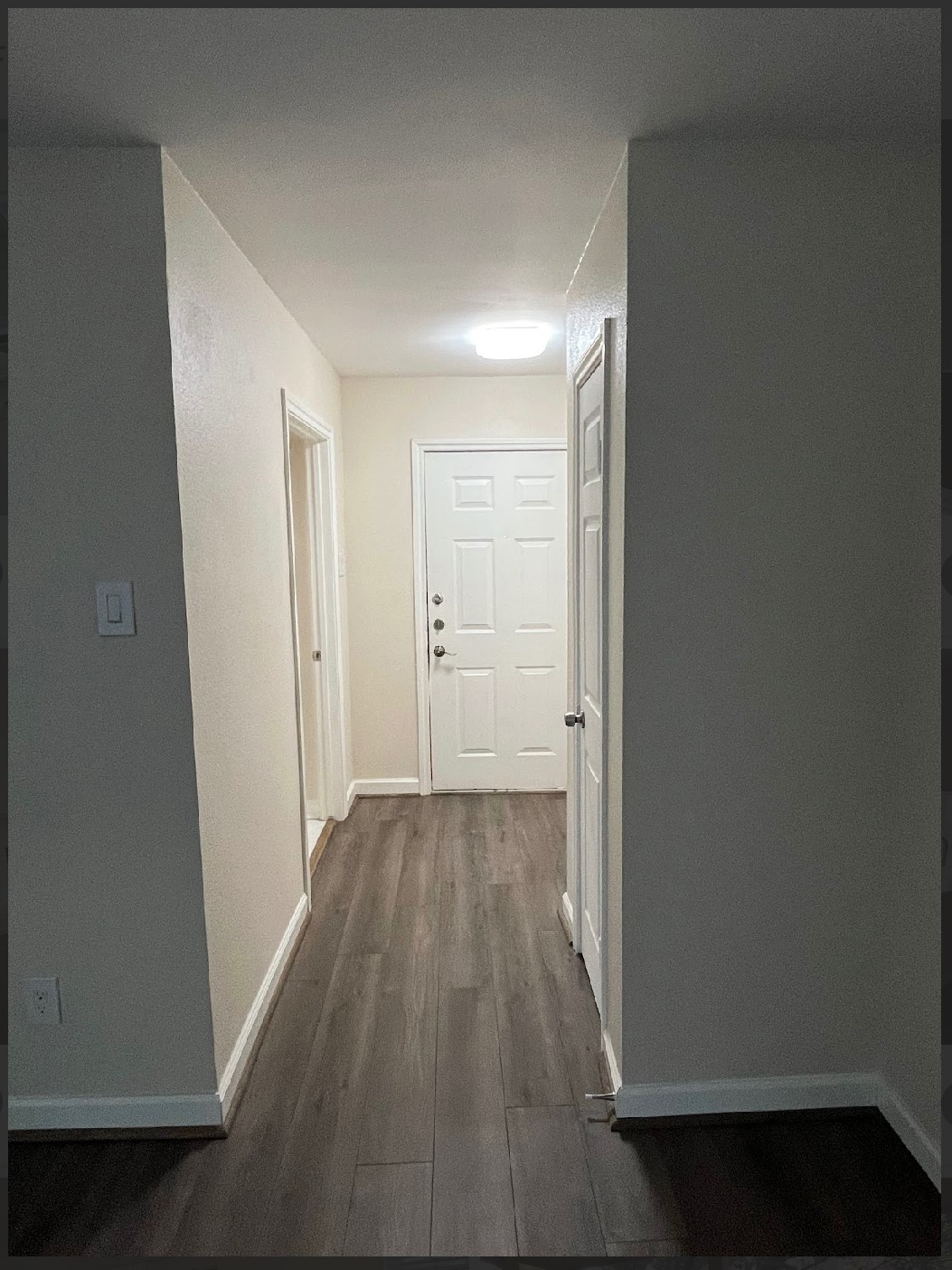 2800 Jeanetta Street, Unit 2706 Houston, TX 77063 - Photo 8 of 19 a view of a hallway with wooden floor