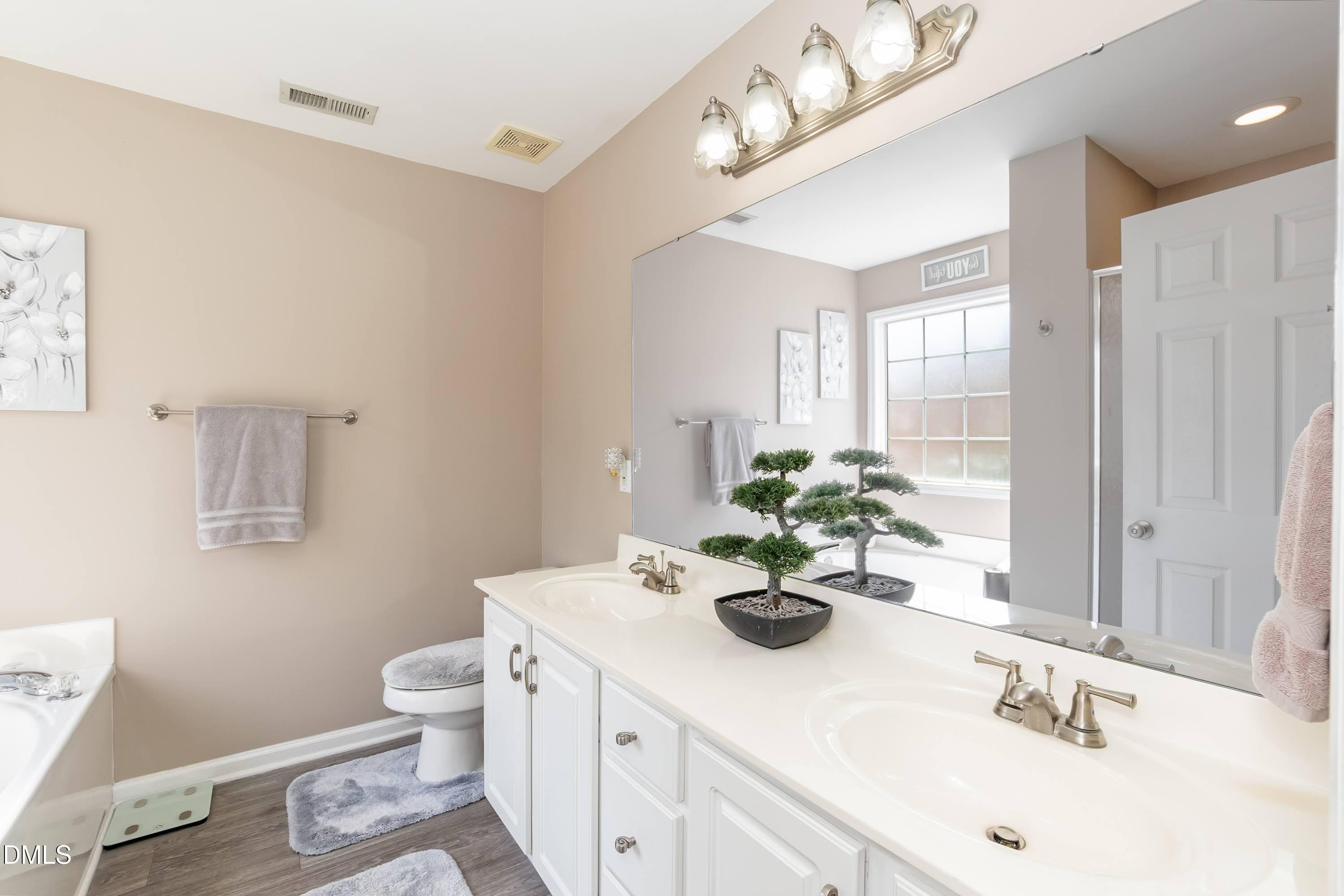 3047 Coxindale Drive Raleigh, NC 27615 - Photo 26 of 33 Primary Bath 01