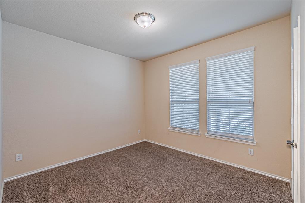 11460 Starlight Ranch Fort Worth, TX 76052 - Photo 22 of 33 an empty room with a window