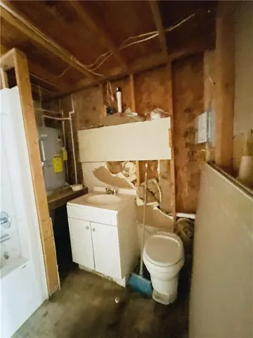 a bathroom with a sink and toilet