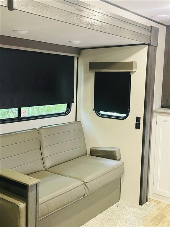 95 Hill Crest Court Cleveland, GA 30528 - Photo 15 of 26 a living room with stainless steel appliances furniture and a window