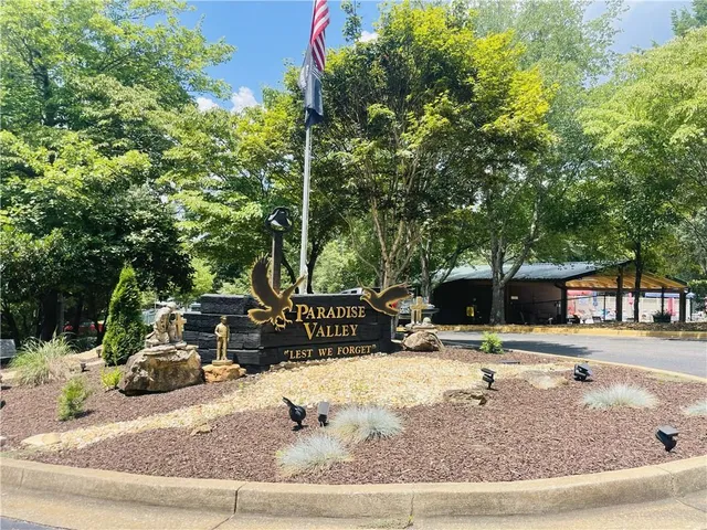 a view of a swimming pool with a patio