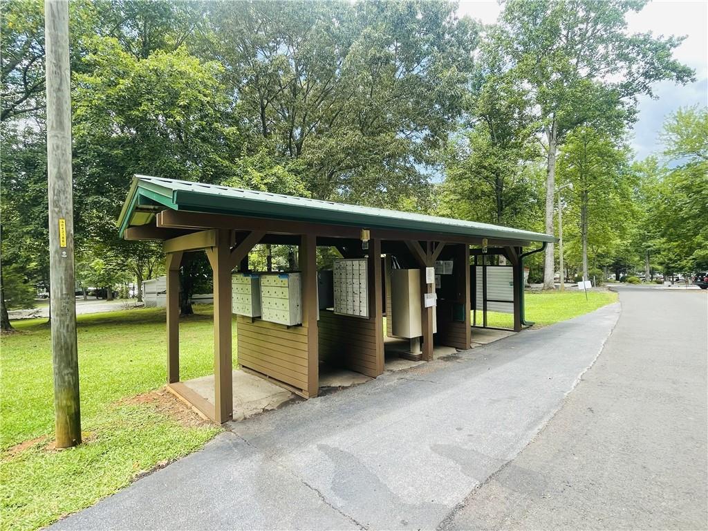 95 Hill Crest Court Cleveland, GA 30528 - Photo 26 of 26 a view of a patio with a table and chairs