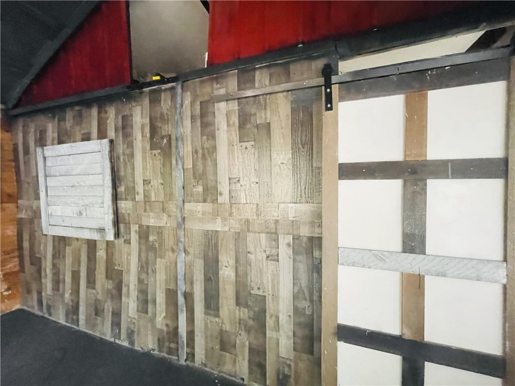 95 Hill Crest Court Cleveland, GA 30528 - Photo 5 of 26 a bathroom with a shower and a window