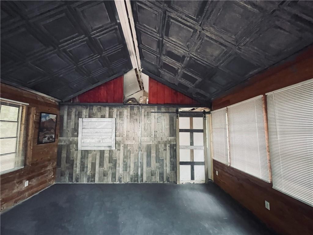 95 Hill Crest Court Cleveland, GA 30528 - Photo 8 of 26 a view of an empty room with a window