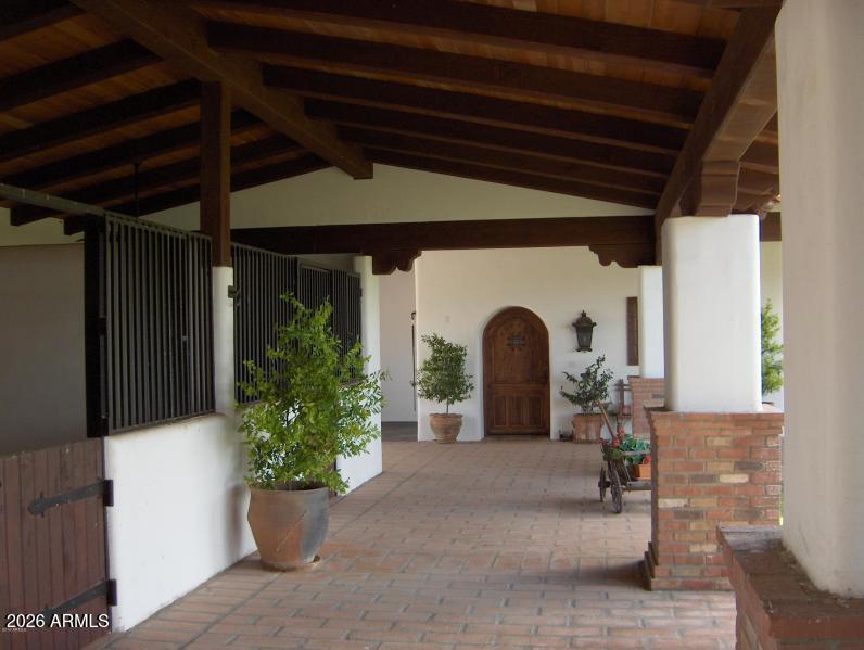 131-2 Amado Montosa Road Amado, AZ 85645 - Photo 5 of 55 a view of a porch with potted plants