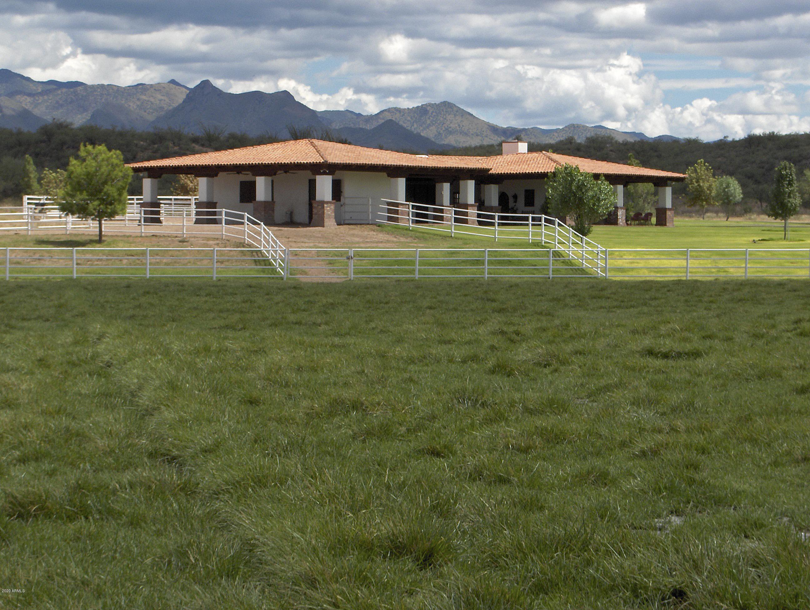 131-2 Amado Montosa Road Amado, AZ 85645 - Photo 9 of 55 a front view of a house with a yard