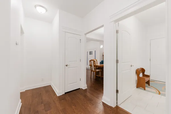 a bathroom with a sink mirror and toilet