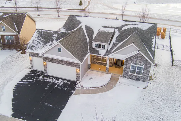 a utility room with multiple dryer and washer