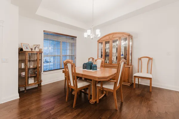a living room with furniture fireplace and flat screen tv