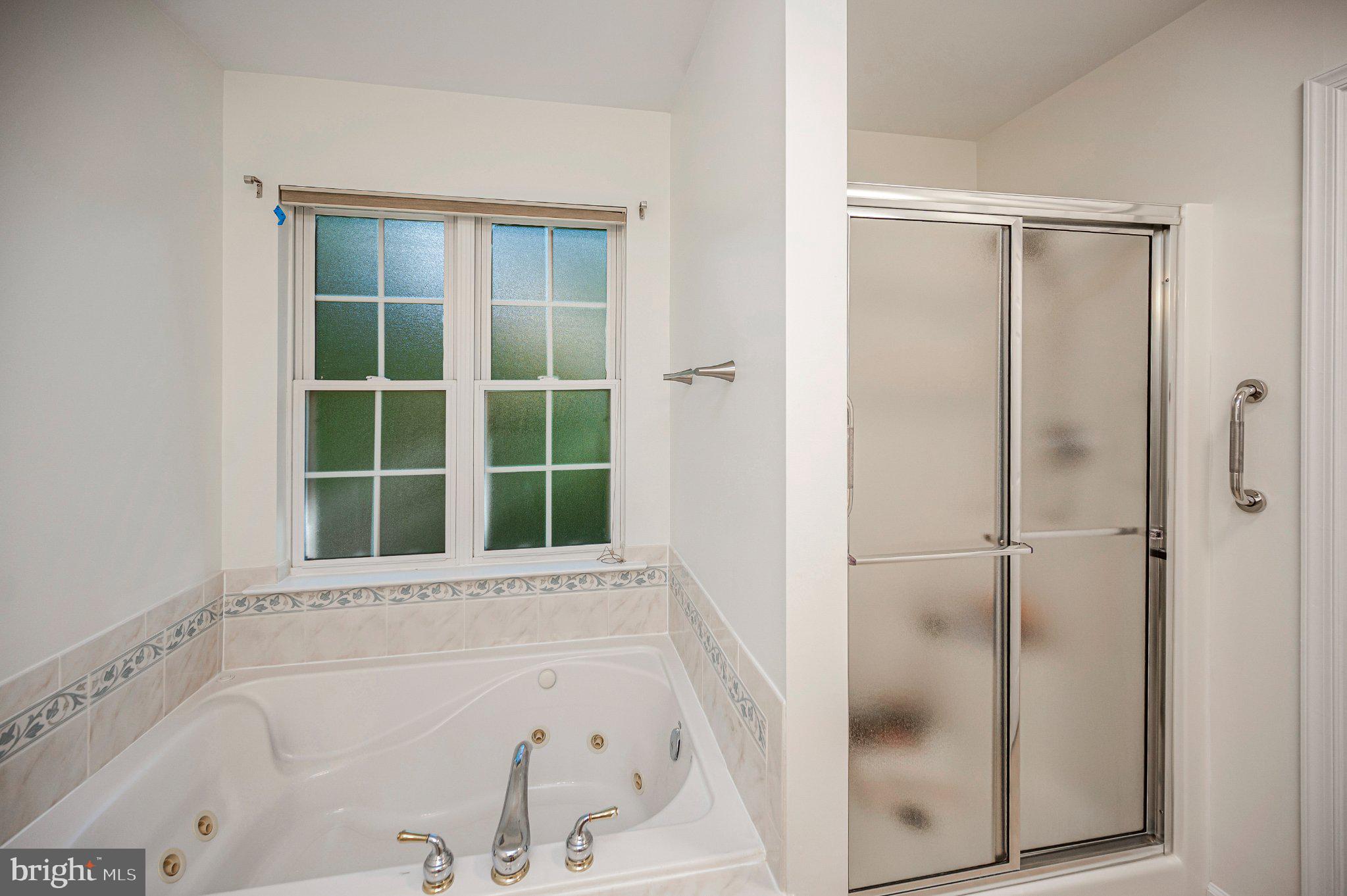 211 Battlefield Road Locust Grove, VA 22508 - Photo 32 of 57 Soak, unwind or refresh in your primary bath