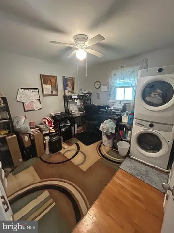 a kitchen with a stove a sink and a stove top oven