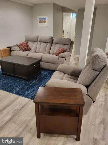 a living room with furniture and a couch