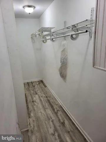 a view of a room with racks on the wall