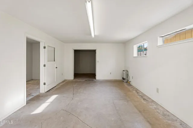 an empty room with a natural light