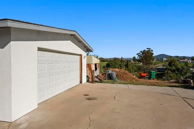 a view of roof and tree