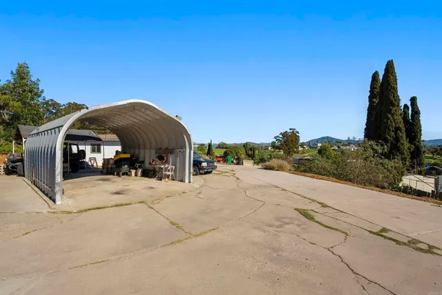 a view of a lake with a house