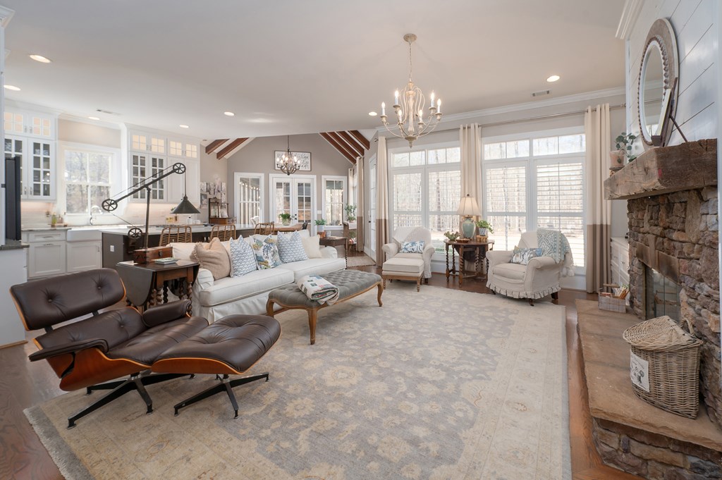 1652 Pierce Road Waverly Hall, GA 31831 - Photo 16 of 51 a living room with furniture and a chandelier