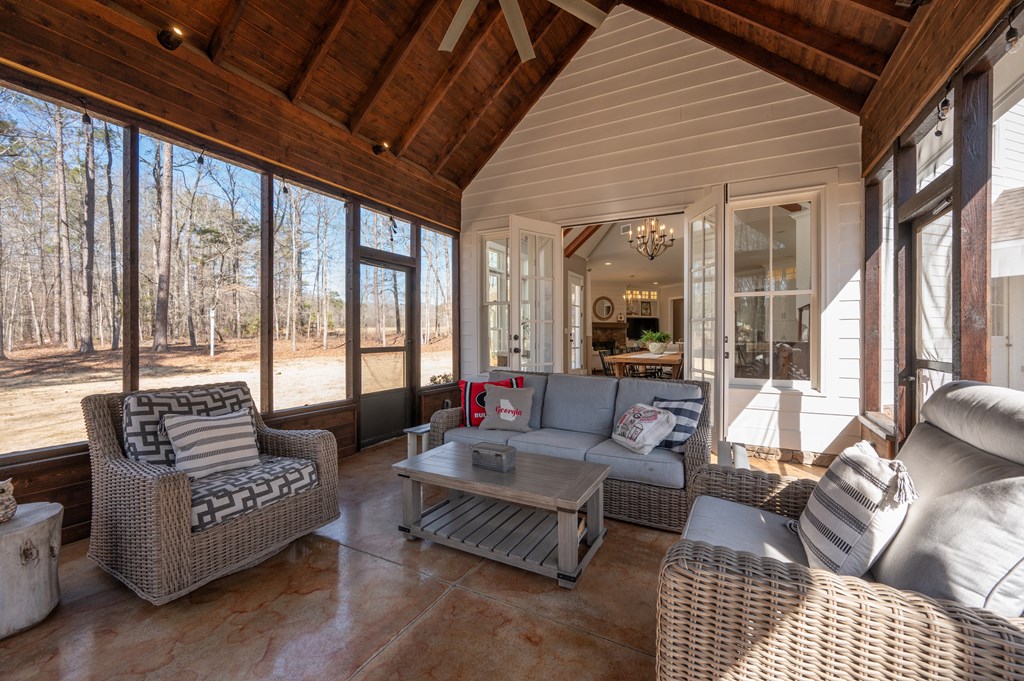 1652 Pierce Road Waverly Hall, GA 31831 - Photo 24 of 51 a living room with furniture and a large window