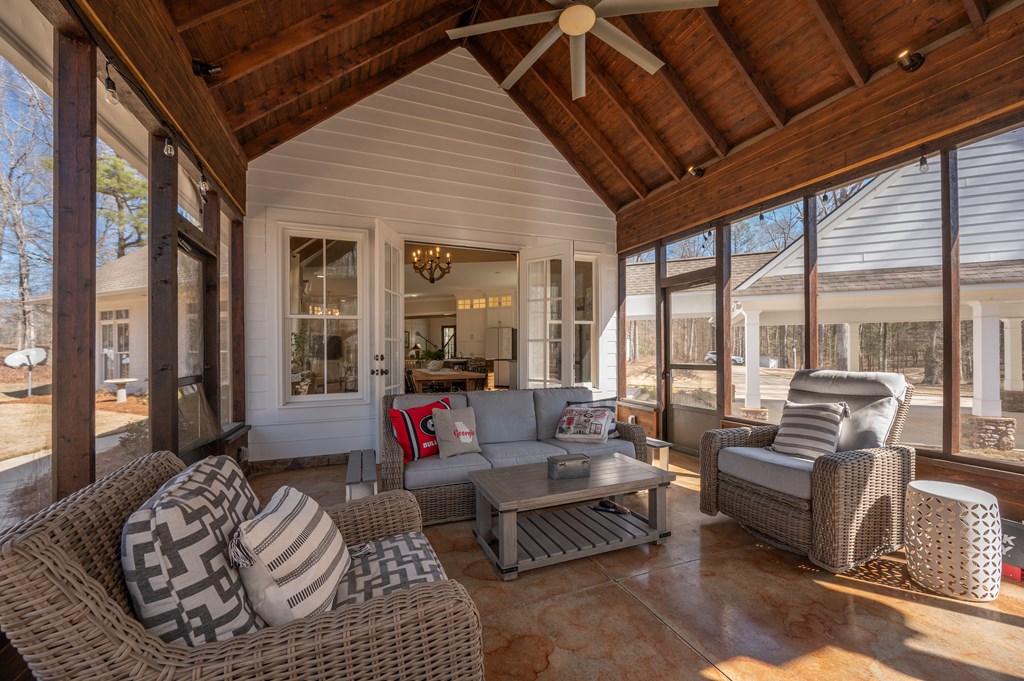 1652 Pierce Road Waverly Hall, GA 31831 - Photo 25 of 51 a living room with furniture or couch and a large window