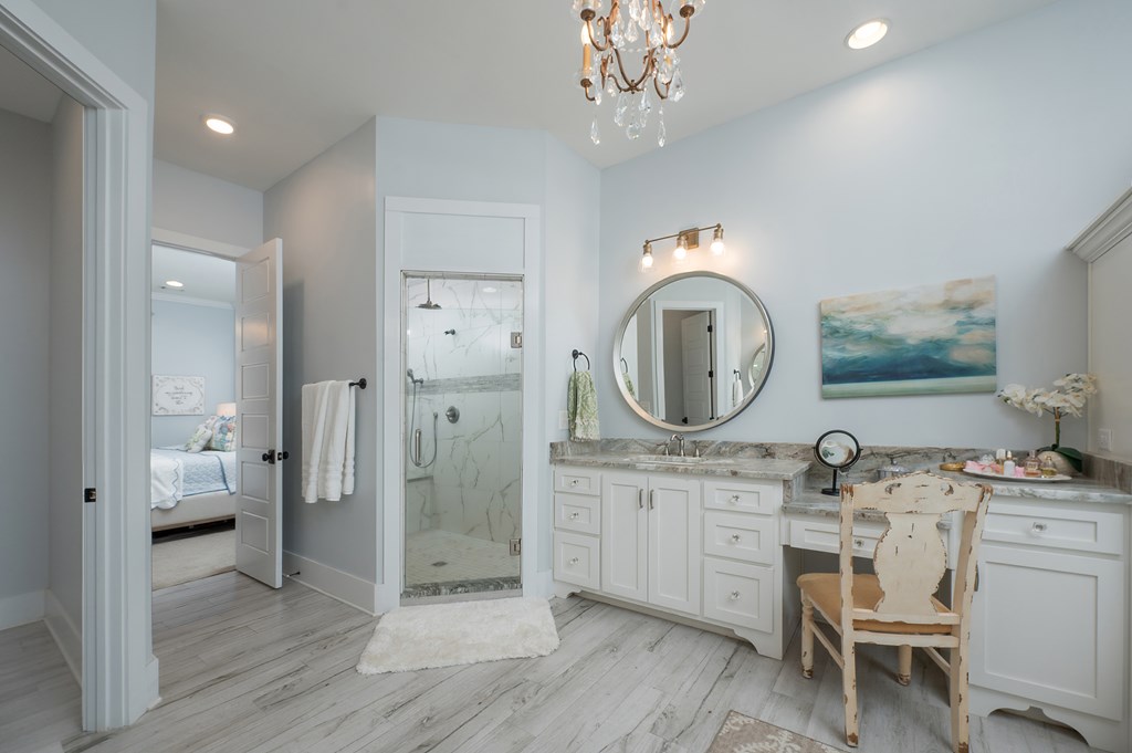 1652 Pierce Road Waverly Hall, GA 31831 - Photo 36 of 51 a spacious bathroom with a mirror a sink and a mirror