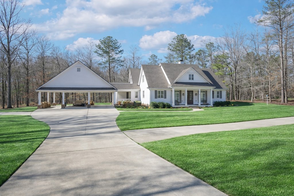 1652 Pierce Road Waverly Hall, GA 31831 - Photo 6 of 51 a front view of house with yard and green space